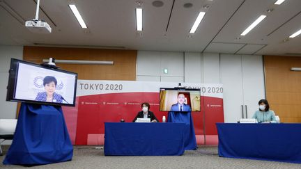 La gouverneure de Tokyo&nbsp;Yuriko Koike, la présidente des Jeux de Tokyo&nbsp;Seiko Hashimoto, le président du Comité international paralympique Andrew Parsons, et la ministre des Jeux olympiques et paralympiques&nbsp;Tamayo Marukawa, en conférence de presse le 16 août 2021 (RODRIGO REYES MARIN / AFP)