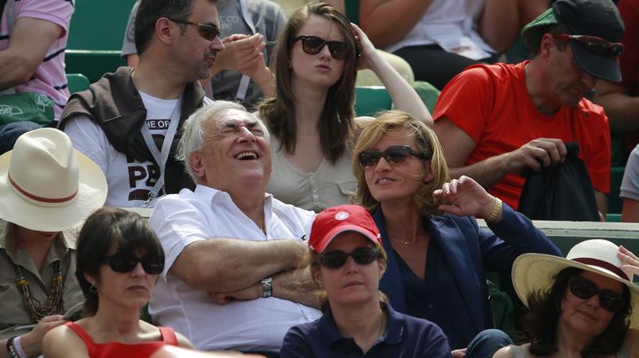 Dominique Strauss-Kahn et Myriam L'Aouffir, le 8 juin 2013 &agrave; Paris, au stade Roland-Garros. (VINCENT KESSLER / REUTERS)