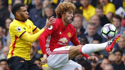 Etienne Capoue en duel avec Marouane Fellaini de Manchester United. (? REUTERS STAFF / REUTERS / X01095)