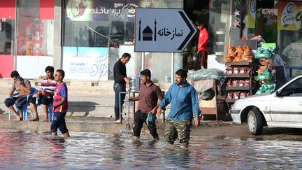 L'Iran est en proie à des inondations historiques, comme ici dans la ville d'Ahvaz, dans le sud-ouest du pays, le 10 avril 2019.&nbsp; (ATTA KENARE / AFP)