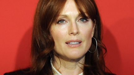 La question de la semaine: sachant que Julianne Moore a 51 ans, pensez-vous qu'elle a eu recours &agrave; 1/ La chirurgie esth&eacute;tique 2/ Des injections de botox 3/ Des injestions d'acide hyaluronique 4/ La totale ? (BRITTA PEDERSEN / DPA / MAXPPP)