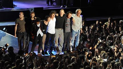 Laurent Voulzy, Jeanne Cherhal, Alain Souchon, Maxime Le Forestier et leurs musiciens aux Francofolies de La Rochelle en juillet 2010.
 (Xavier Leoty/AFP)