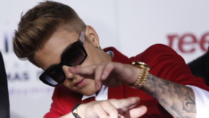 Le chanteur Justin Bieber lors de la premi&egrave;re du documentaire qui lui est consacr&eacute;, le 18 d&eacute;cembre 2013 &agrave; Los Angeles (Etats-Unis). (MARIO ANZUONI / REUTERS)