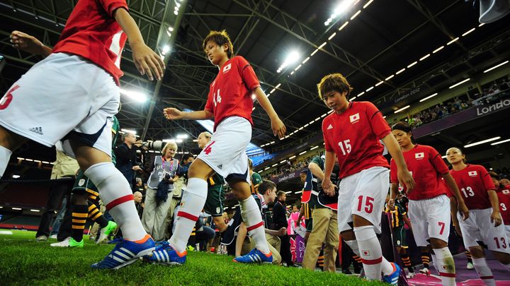 Les joueuses japonaises avant leur match contre l'Afrique du Sud, le 31 juillet.&nbsp; (GLYN KIRK / AFP)