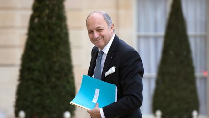 Le ministre des Affaires &eacute;trang&egrave;res, Laurent Fabius, arrive &agrave; l'Elys&eacute;e, le 5 mars 2013. (BERTRAND LANGLOIS / AFP)