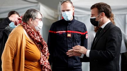 Le président de la République, Emmanuel Macron, le 23 mars 2021 à Valenciennes (Nord). (YOAN VALAT / AFP)