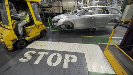 En cas de chômage technique de longue durée, l'APLD porte la rémunération à 75% du salaire brut (90% du net environ). (AFP PHOTO / DAMIEN MEYER)