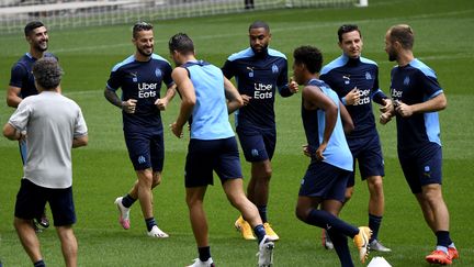 Les joueurs de l'Olympique de Marseille, vendredi, à l'entraînement. (NICOLAS TUCAT / AFP)