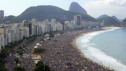 Plus de trois millions de fid&egrave;les ont particip&eacute; &agrave; la messe finale des JMJ sur la plage de Copacabana, le 28 juillet 2013 &agrave; Rio (Br&eacute;sil) selon le porte-parole du Vatican. (TASSO MARCELO / AFP)