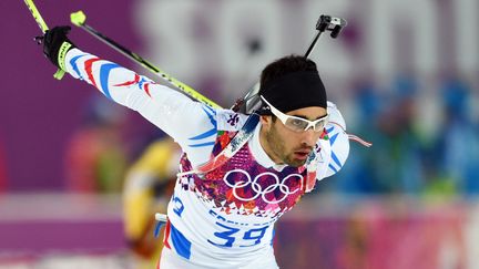 Le biathl&egrave;te Martin Fourcade, le 8 f&eacute;vrier 2014, lors de l'&eacute;preuve de sprint des JO de Sotchi, en Russie. (PHILIPPE MILLEREAU / AFP)