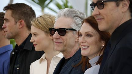 Le film de David Cronenberg a marqué les esprits. Autour du réalisateur canadien, Robert Pattinson, Mia Wasikowska, Julianne Moore et John Cusack  
 (VALERY HACHE / AFP)