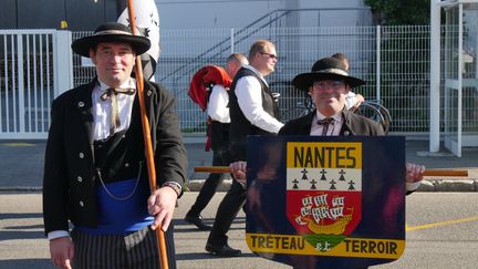 La Grande Parade est le point d'orgue de l'Interceltique, plus grand festival dédié à la culture et à la musique celtique. Les 71 troupes présentes représentent la Bretagne, l'Ecosse, l'Irlande, le Pays de Galles, les Etats-Unis, les Asturies...
 (Elise Koutnouyan)