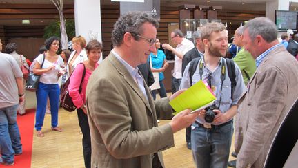 Christian Paul, d&eacute;put&eacute; de la Ni&egrave;vre, dans le hall d'accueil de l'Espace Encan &agrave; La Rochelle, pour l'universit&eacute; d'&eacute;t&eacute; du Parti socialiste, le 24 ao&ucirc;t 2012. (SALOME LEGRAND / FVTI)