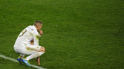 L'attaquant du Real Madrid, Karim Benzema, lors d'un match le 25 janvier 2012. (PIERRE-PHILIPPE MARCOU / AFP)