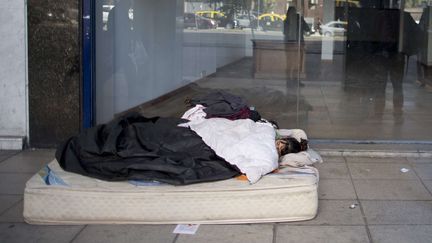  (Une SDF dans une rue de Buenos-Aires en Argentine © Sipe Press)