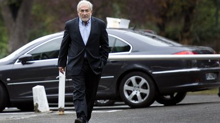 Dominique Strauss-Kahn &agrave; Sarcelles (Val-d'Oise), le 9 octobre 2011. (MIGUEL MEDINA /&nbsp;AFP PHOTO)