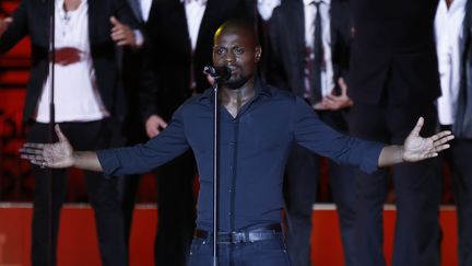 Kery James, le 7 septembre 2013, sur la scène des Jeux de la francophonie, à Nice (Alpes-Maritimes). (VALERY HACHE / AFP)