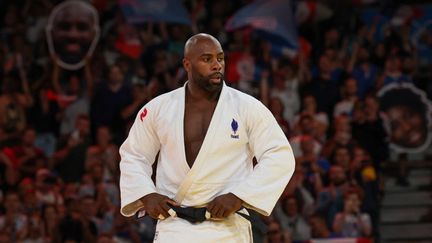 Teddy Riner vient de battre le Sud-coréen Lee Joon-hwan en quart de finale de l'épreuve mixte de judo par équipes, samedi 3 août, aux Jeux olympiques de Paris 2024. (JACK GUEZ / AFP)