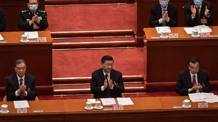 Le président de la Chine, Xi Jinping, lors de la fermeture de la session plenière de l'assemblée nationale populaire&nbsp;(ANP), le 11 mars 2021. (NICOLAS ASFOURI / AFP)