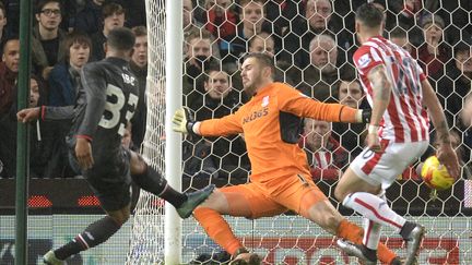 Jordan Ibe, buteur avec Liverpool contre Stoke en demi-finale de la Coupe de la Ligue anglaise (OLI SCARFF / AFP)