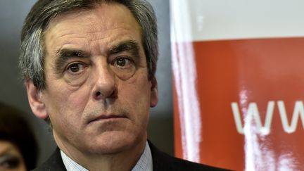 "Le travail de ma femme était légal, parfaitement transparent", a déclaré François Fillon, jeudi 26 janvier 2017, à propos des soupçons d'emplois fictifs de son épouse. (GEORGES GOBET / AFP)