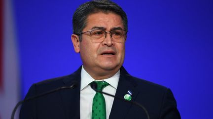 Le président hondurien Juan Orlando Hernandez lors de la COP26, le 1er novembre 2021 à Glasgow (Ecosse). (ANDY BUCHANAN / AFP)