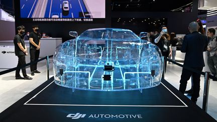 Unconcept de voiture DJI présentée au salon automobile de Shangaï (Chine), le 20 avril 2021. (HECTOR RETAMAL / AFP)