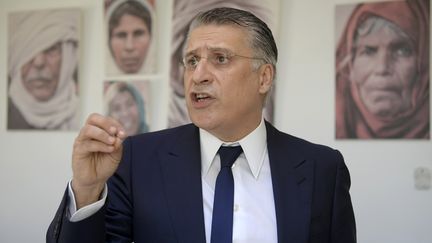 Le patron de la chaîne privée Nessma TV et candidat à la présidentielle Nabil Karoui à son bureau de Tunis le 18 juin 2019 (FETHI BELAID / AFP)