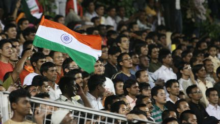 Des supporters indiens &agrave; New Delhi apr&egrave;s la victoire de l'&eacute;quipe nationale face &agrave; la Syrie, en finale de la Nehru Cup, le 31 ao&ucirc;t 2009. (QAMAR SIBTAIN / GETTY IMAGES)