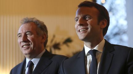 François Bayrou et Emmanuel Macron, le 23 février 2017, au Palais de Tokyo à Paris. (JACQUES DEMARTHON / AFP)