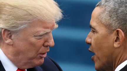 Donald Trump et Barack Obama, au Capitole à Washington (Etats-Unis), le 20 janvier 2017. (CARLOS BARRIA / REUTERS / X90035)