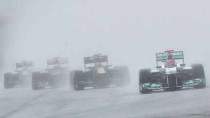 Le GP de Malaisie 2012 sous la pluie (ROSLAN RAHMAN / AFP)