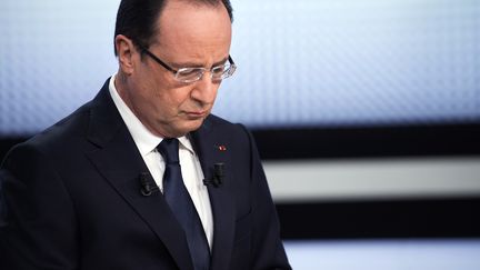 Fran&ccedil;ois Hollande sur le plateau de France 2, &agrave; Paris, le 28 mars 2013. (FRED DUFOUR / AFP)