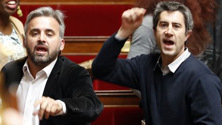 Les députés insoumis Alexis Corbière et François Ruffin à l'Assemblée nationale, le 11 avril 2018. (FRANCOIS GUILLOT / AFP)