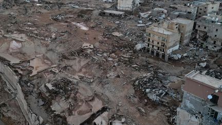 Des bâtiments détruits à Derna, dans l'est de la Libye, après les inondations qui ont frappé la ville,  le 13 septembre 2023. (WESAM ALHAMALE / AFP)