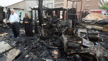 Attentat meurtrier en Irak, à 15 km de Bagdad, le 5 juillet 2011. (AHMAD AL-RUBAYE / AFP)