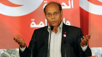 Le pr&eacute;sident tunisien, Moncef Marzouki, fait un discours &agrave; l'occasion de l'anniversaire du d&eacute;part de l'ancien pr&eacute;sident Ben Ali, le 14 janvier 2012 &agrave; Tunis.&nbsp; (FETHI BELAID / AFP)