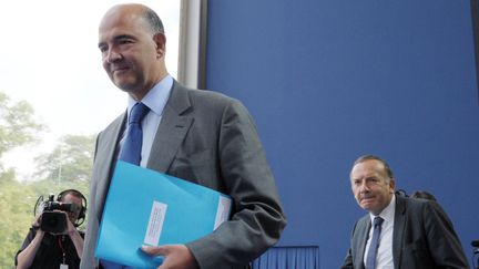 Le ministre de l'Economie, Pierre Moscovici, le 29 ao&ucirc;t 2013 &agrave; Jouy-en-Josas (Yvelines), lors de l'universit&eacute; d'&eacute;t&eacute; du Medef. (ERIC PIERMONT / AFP)