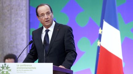 Le pr&eacute;sident de la R&eacute;publique, Fran&ccedil;ois Hollande, lors de la conf&eacute;rence environnementale, le 14 septembre 2012, &agrave; Paris. (JACKY NAEGELEN / AFP)