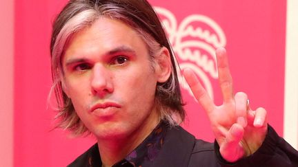 Le&nbsp;rappeur français OrelSan le 10 octobre 2021 au festival Cannes Séries, où il venait présenter la série documentaire "Montre jamais ça à personne", qui lui est consacrée. (VALERY HACHE / AFP)