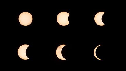 Ce photomontage montre l'évolution de l'éclipse annulaire vue depuis Hong Kong, le 21 juin 2020. (ISAAC LAWRENCE / AFP)