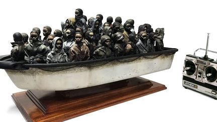 L'oeuvre de Banksy en résine et fibre de verre mise en jeu en faveur de l'aide aux migrants.
 (Banksy /ww.choose.love)