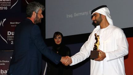 Le  prix du meilleur long métrage au réalisateur kurde Hussein Hassan 
 (NEZAR BALOUT / AFP)