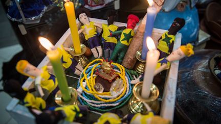 Mise en scène d'une séance vaudou, à Rio de Janeiro, le 3 juillet 2014. (YASUYOSHI CHIBA / AFP)