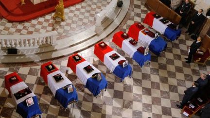 Obèques aux Invalides pour des soldats tués en Afghanistan (19 juillet 2011) (JACQUES BRINON / POOL / AFP)