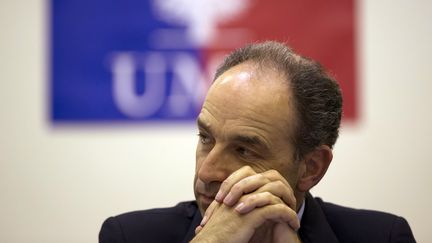 Le pr&eacute;sident de l'UMP, Jean-Fran&ccedil;ois Cop&eacute;, le 3 juillet 2013 &agrave; Paris.&nbsp; (KENZO TRIBOUILLARD / AFP)