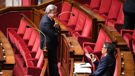 Jean-Luc Mélenchon (LFI) et Olivier Faure, Premier secrétaire du PS, à l'Assemblée nationale le 28 avril 2020. (DAVID NIVIERE/POOL/AFP)