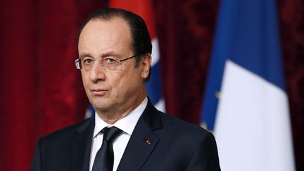 Le pr&eacute;sident fran&ccedil;ais, Fran&ccedil;ois Hollande, lors d'une conf&eacute;rence de presse &agrave; l'Elys&eacute;e, le 3 f&eacute;vrier 2014. (PATRICK KOVARIK / AFP)