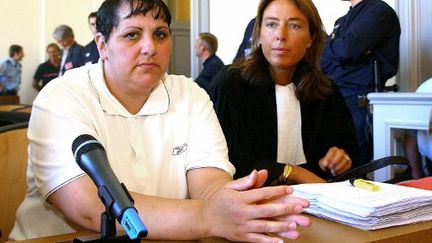 Myriam Delay Badaoui au début de l'audience, le 08 Juin 2004. (PHILIPPE HUGUEN / AFP)