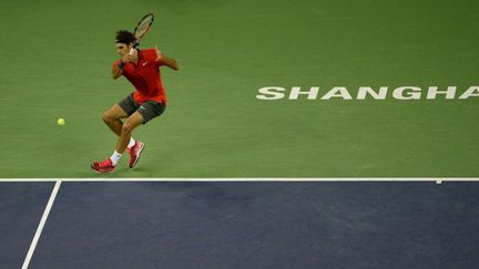 Roger Federer a livré un récital pour dominer Novak Djokovic (Shanghai 2014) (JIA RU / AFP)